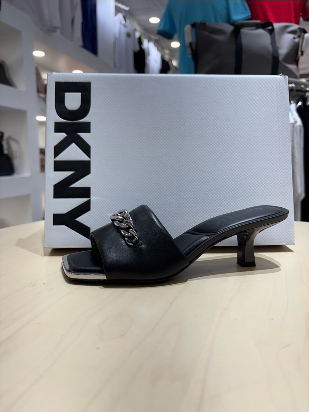DKNY Black Slide Mule with Silver Chain Accent